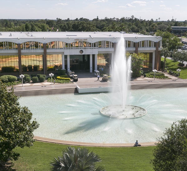 aerial view of reflecting pond and millican hall