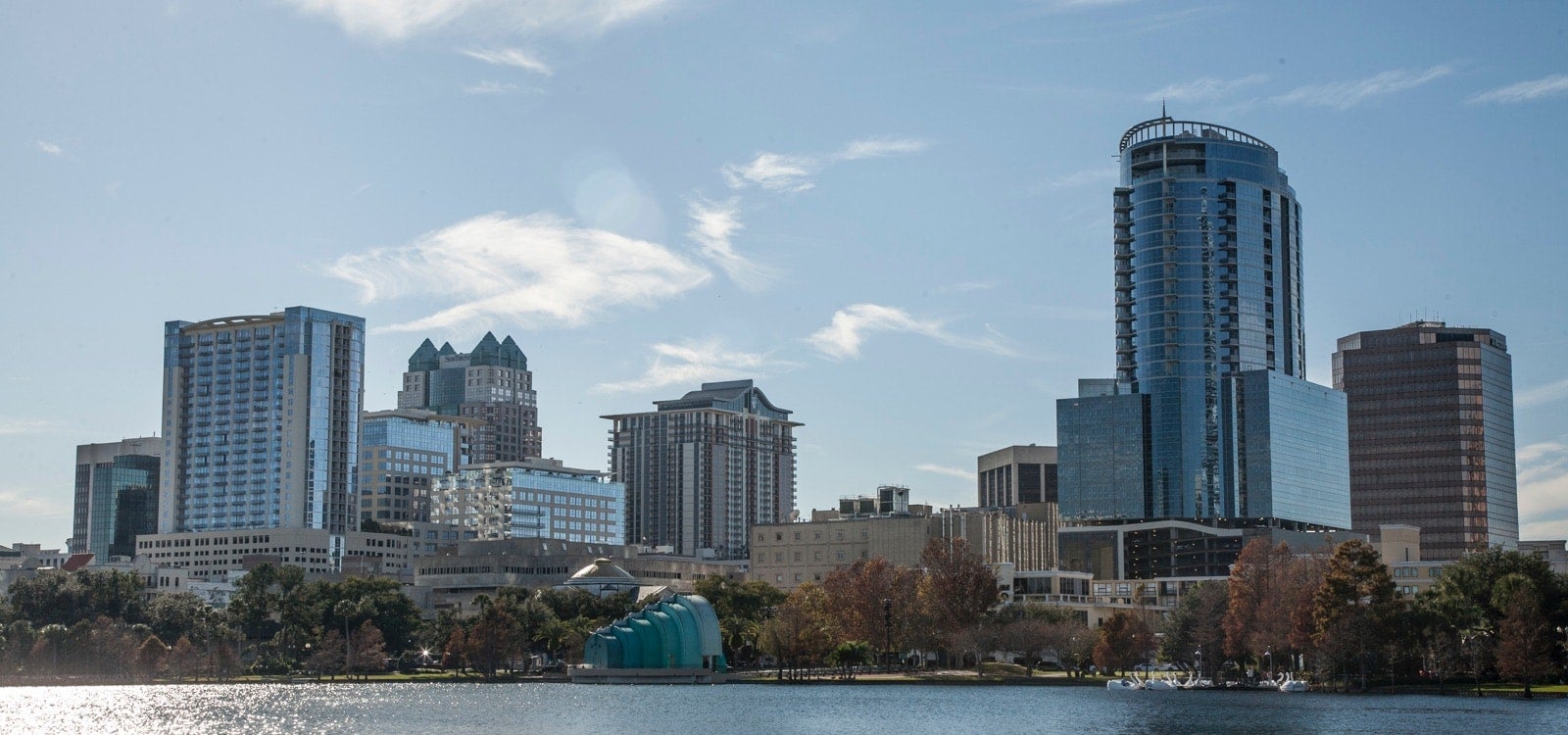 view of downtown orlando buildings from lake eola park