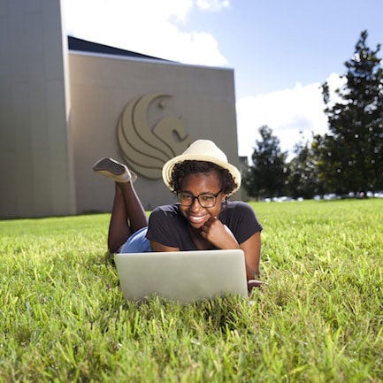 student reviewing admissions materials