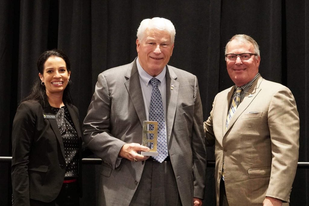 Pictured (L-R): UCF Community Relations Associate Vice President and Director Maritza Martinez; UCF President John C. Hitt; and City of Orlando Mayor Buddy Dyer.