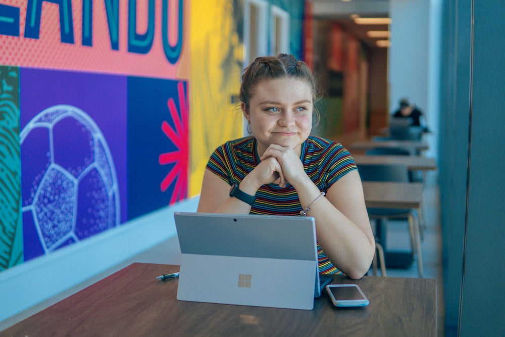 girl sitting at table