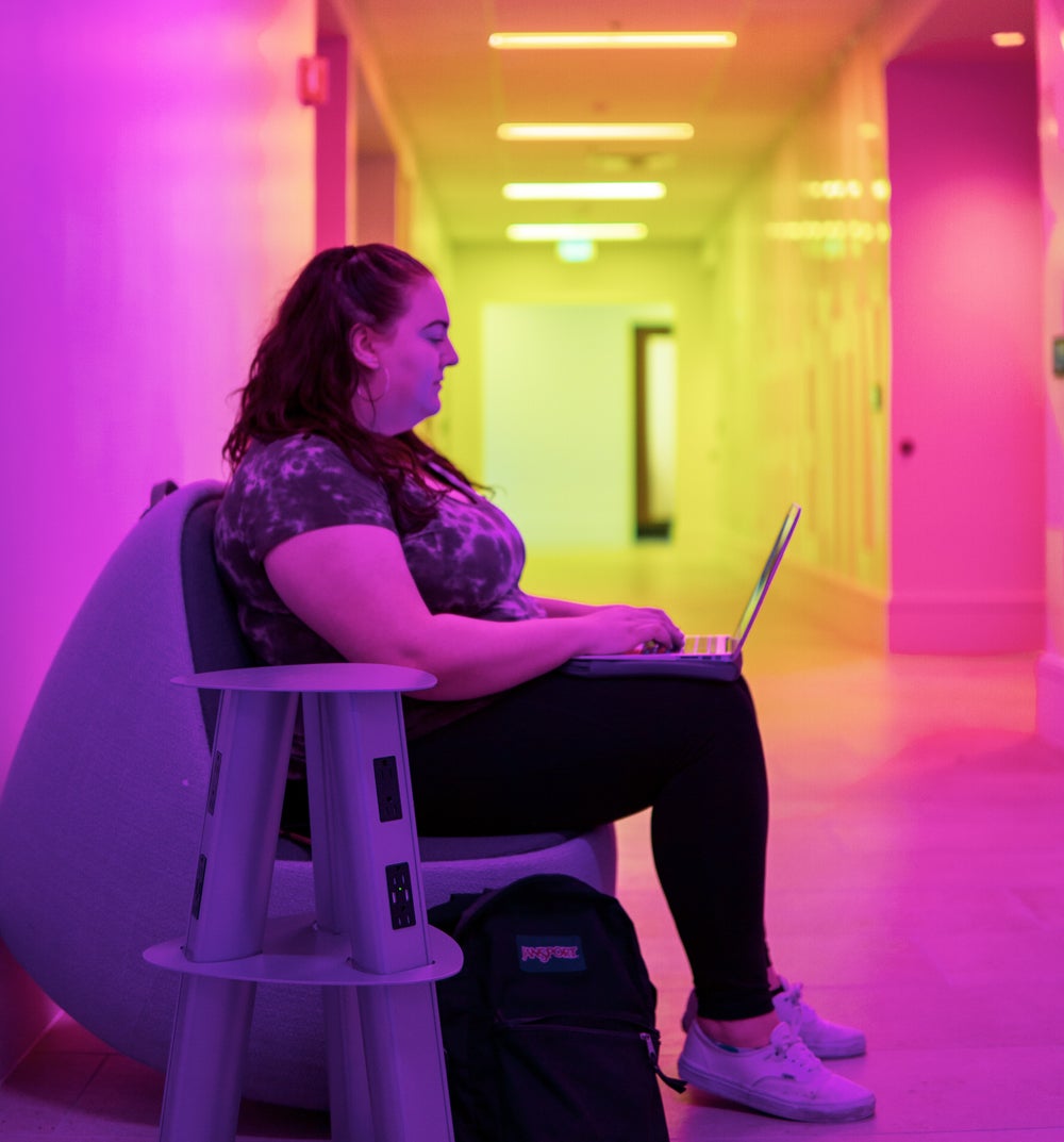 girl in colorful hallway