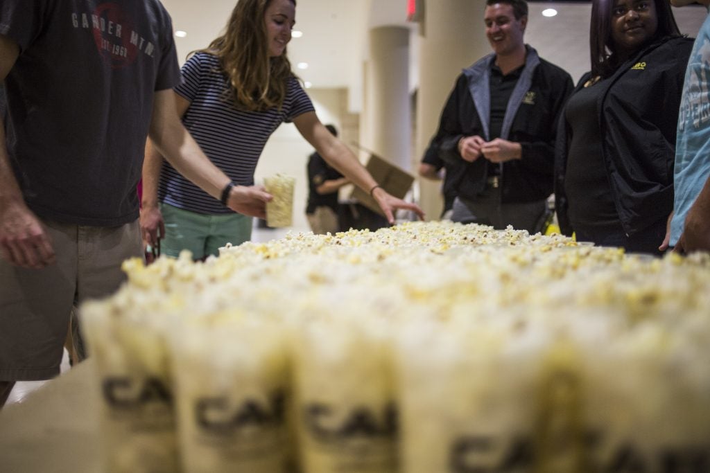 students with popcorn