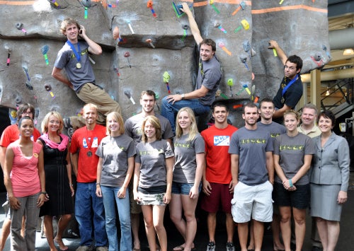 Maribeth Ehasz, vice president SDES, (right front row), Jim Wilkening, director RWC, (right back row) and Sharon Ekern, associate vice president, (second in left back row) pose for a photo with the UCF Rock Climbing Club 