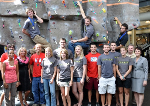 Maribeth Ehasz, vice president SDES, (right front row), Jim Wilkening, director RWC, (right back row) and Sharon Ekern, associate vice president, (second in left back row) pose for a photo with the UCF Rock Climbing Club