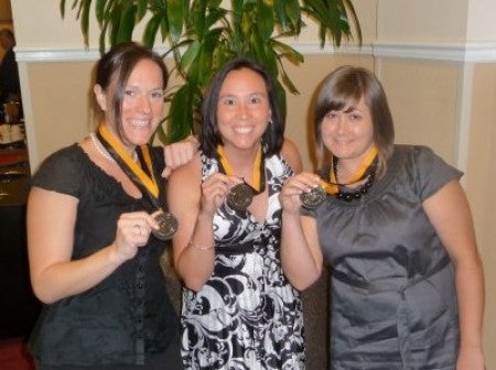 Sarah Parker, Joyce DeGennaro and Mary Amber Davis with their Pegasus medals.