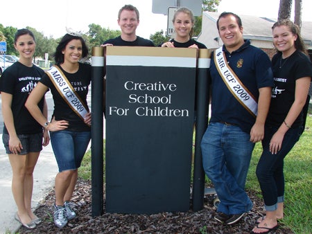UCF 2009, Tyson Nales, and Miss UCF 2009, Dasha Gonzalez, and members of the American Student Dental Association