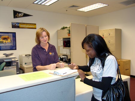 Student signs into the University Testing Center.