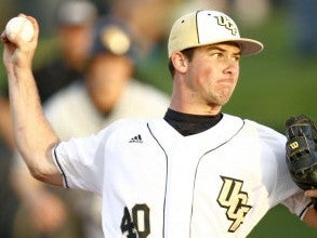 ucf baseball pitcher in mid-pitch