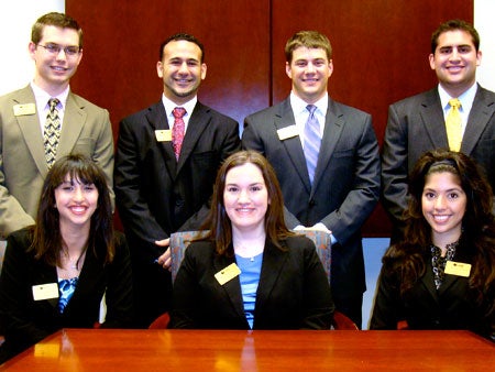 Photo: (left to right, top) Matt Hall, Charlie Bateh, Tyler Wilson, Ryan Chu; (bottom) Emily Vurnakes, Anne Bodiford, Jaqueline Herrera will represent UCF in the National Collegiate Sales Competition in March.