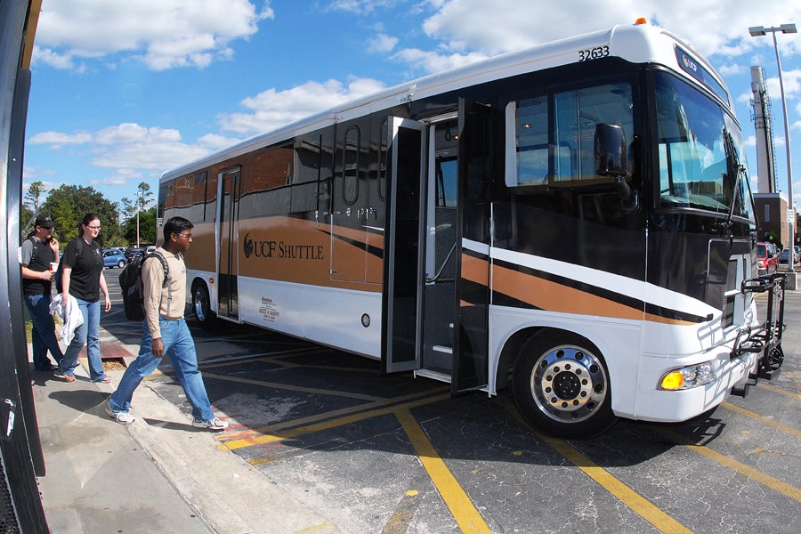 students boarding ucf shuttle