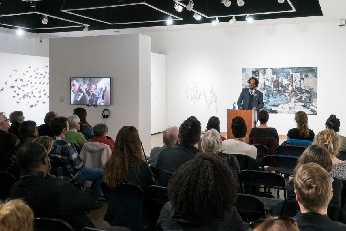 Mengestu spoke at the UCF Art Gallery, where the exhibit Finding Home: The Global Refugee Crisis is on display through Feb. 2. (Photo by Bernard Wilchusky ’18)