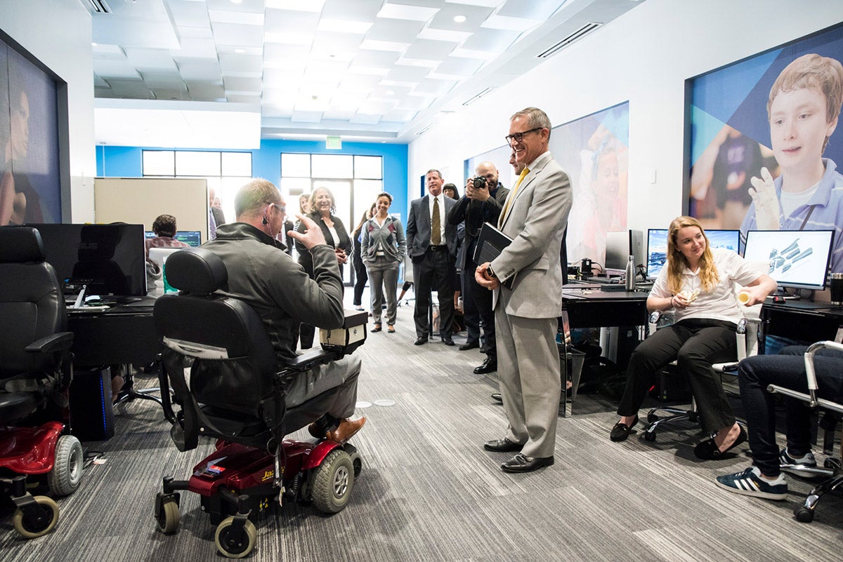 During the interview process, Whittaker met with UCF researchers at Limbitless Solutions, a nonprofit started by an alumnus that provides affordable 3D-printed bionic limbs for children. (Photo by Nick Leyva ’15)