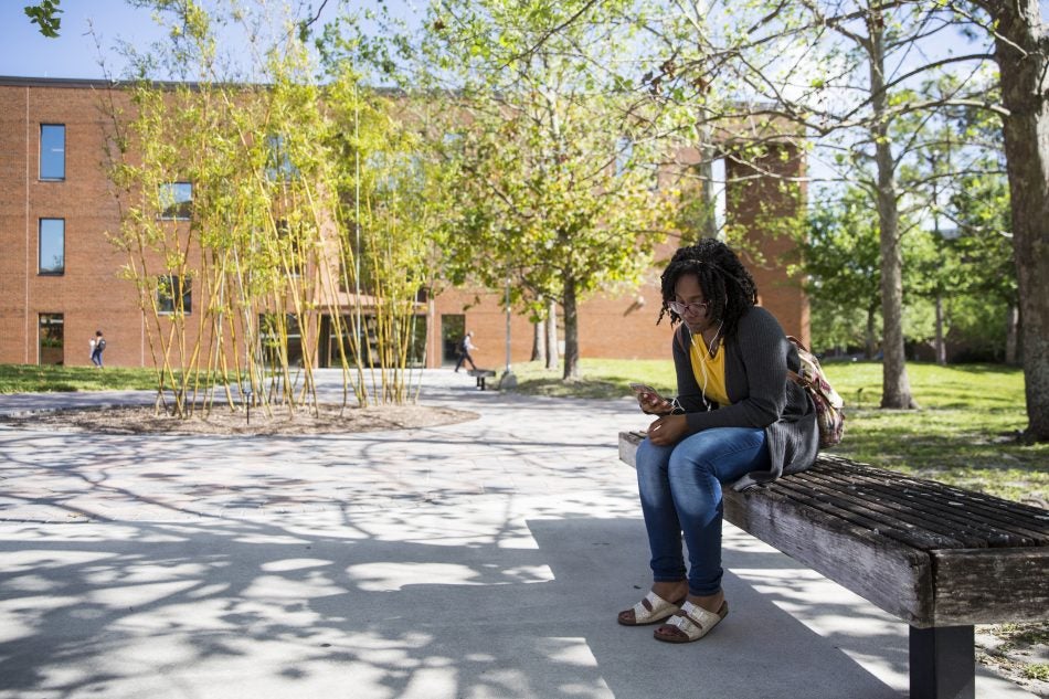 The Education Complex's courtyard is a quiet area to listen to music and enjoy the weather. 