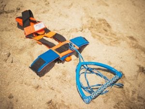  new piece of beach gear called the “Skimvest.” It allows the wearer to run along shallow water while towing a person behind on a skimboard.