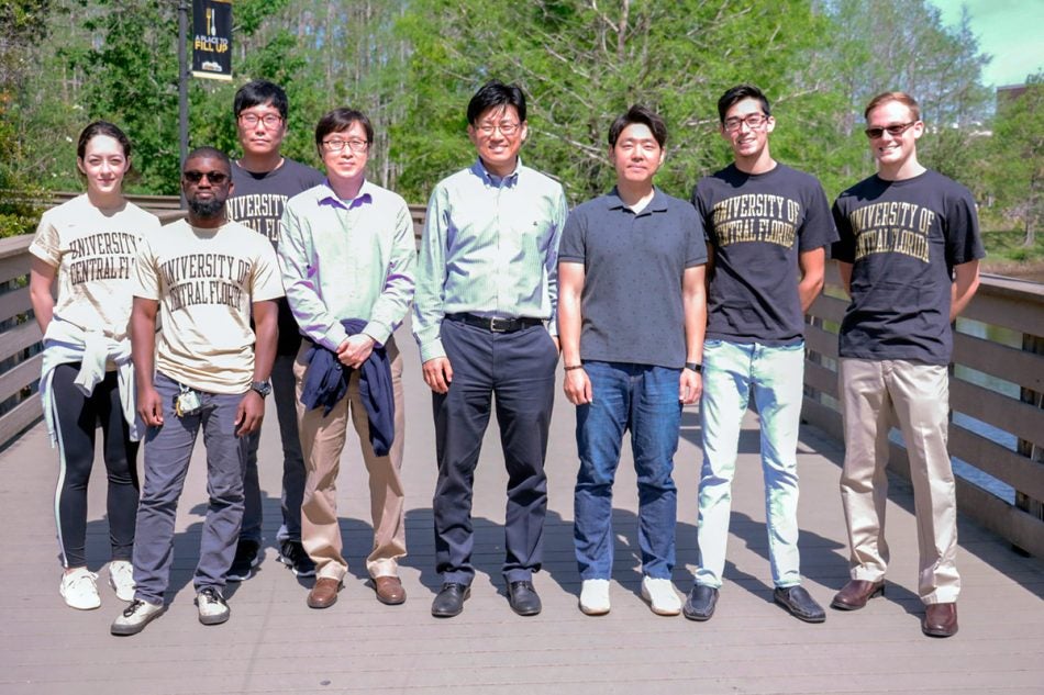 UCF Professor Woo Hyoung Lee and the team of students who developed the sponge. (Photo by Karen Norum)