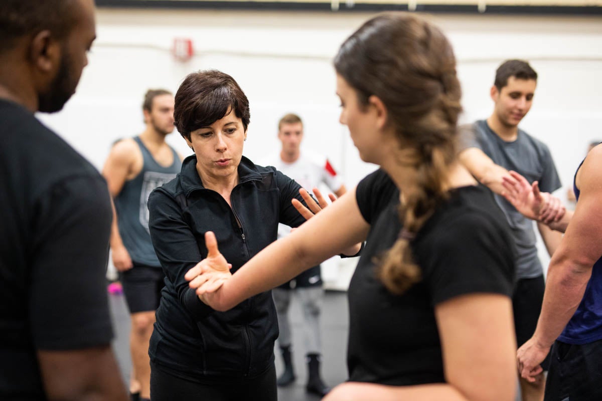 Instructor Keri Higby '09 guides two students are they work through an escape exercise. (Photo by Nick Leyva '15)