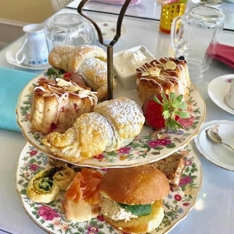 The Pixie — chef’s selection of assorted savory and sweet items, served with a traditional biscuit scone and cream and a pot of tea of your choice.