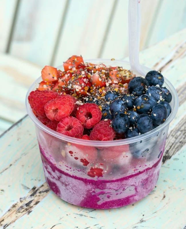 Tequesta Dragon — An acai bowl with dragon fruit, blueberry, raspberry, strawberry, chia seeds, hemp seeds and bee pollen.