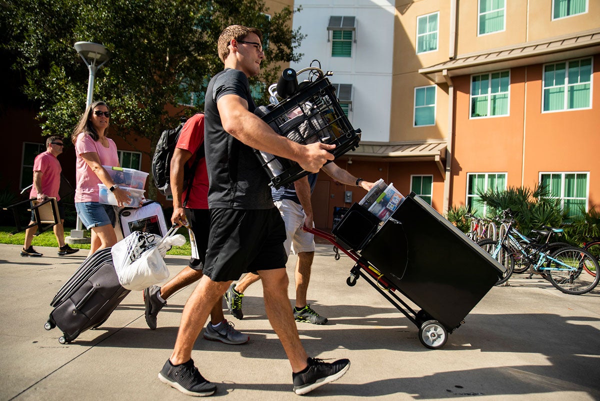 Photo of students moving into dorms