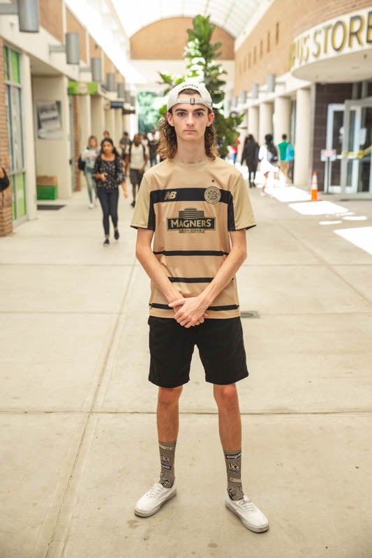 ucf staredown kid by bookstore