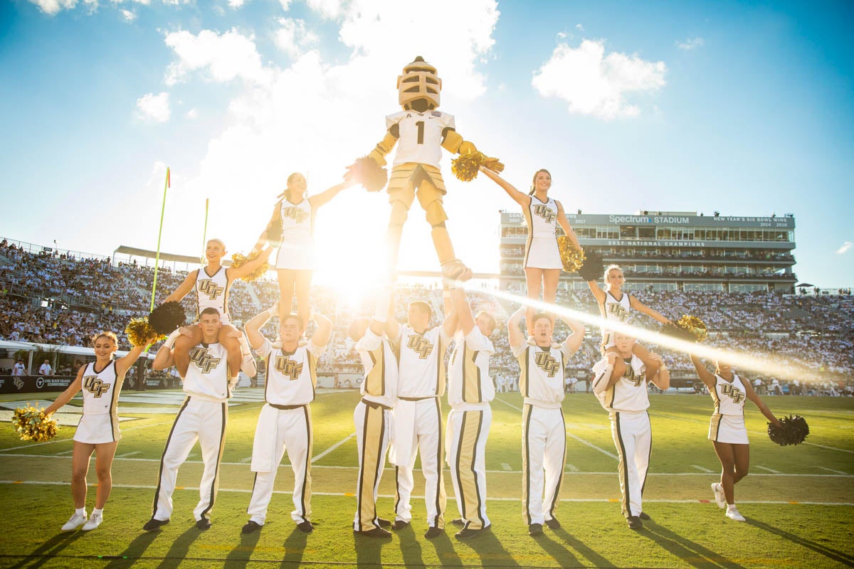 Knightro and the cheer team entertain a packed stadium during UCF's game against Pittsburg, which ended in a 45 - 14 win for the Knights.