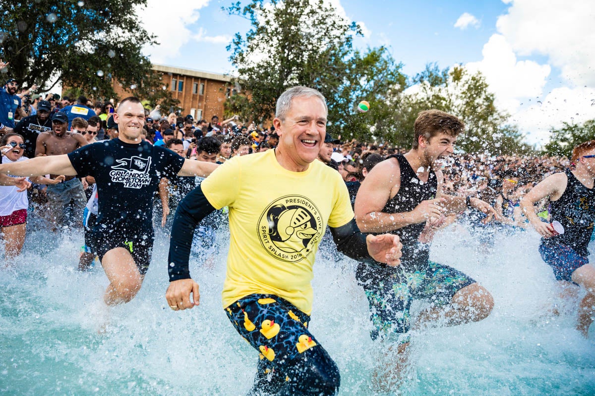 During this year's Spirit Splash, UCF President Dale Whittaker jumped into the Reflecting Pond alongside students.