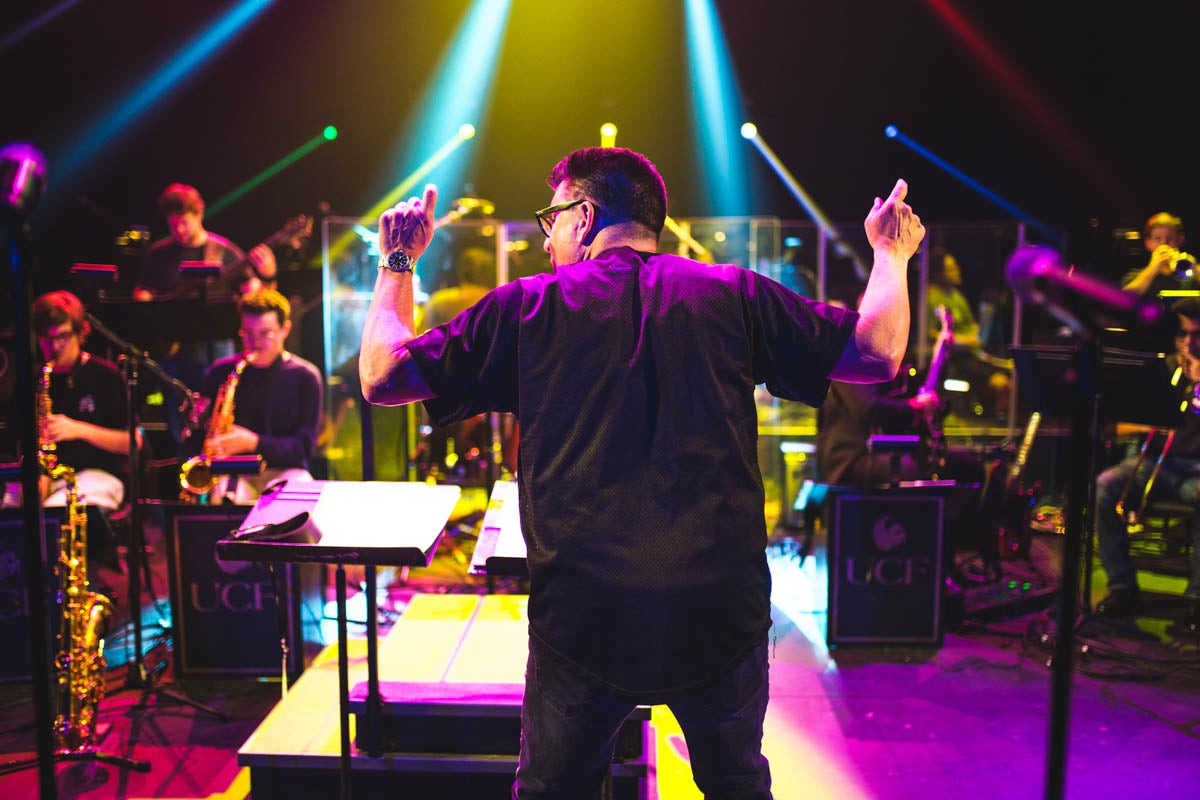 Director of jazz studies and Pegasus Professor Jeff Rupert conducts a Flying Horse Big Band performance during UCF Celebrates the Arts.