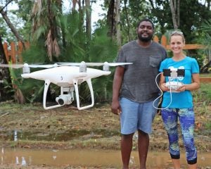 <em>Citizen Science GIS drone training with Lain Graham, senior research mentor at the Belize site, and Ted McKoy, Hopkins Village Council Chairman (Photo Credit: Citizen Science GIS)</em>