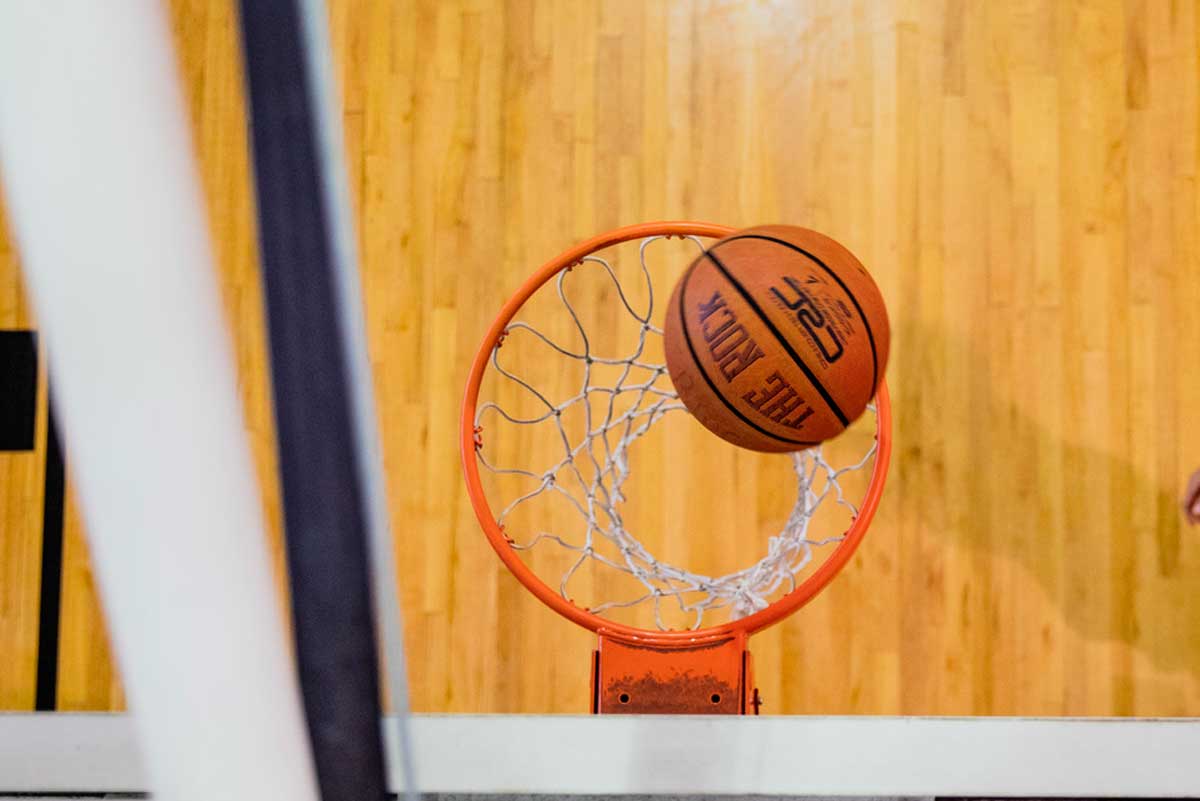 basketball in hoop from above angle