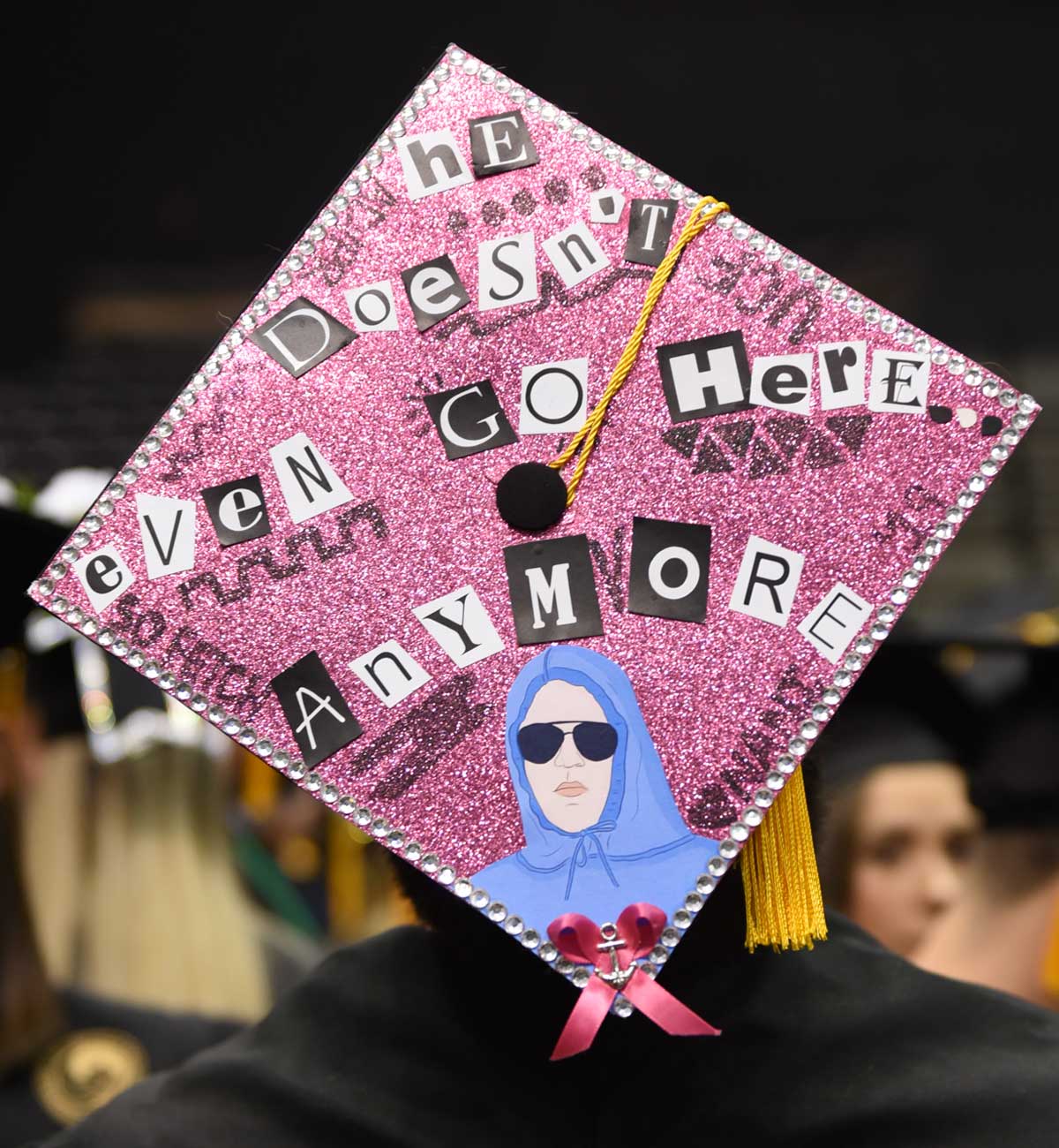 Grad cap decorated with Mean Girls quote: He doesn't even go here anymore