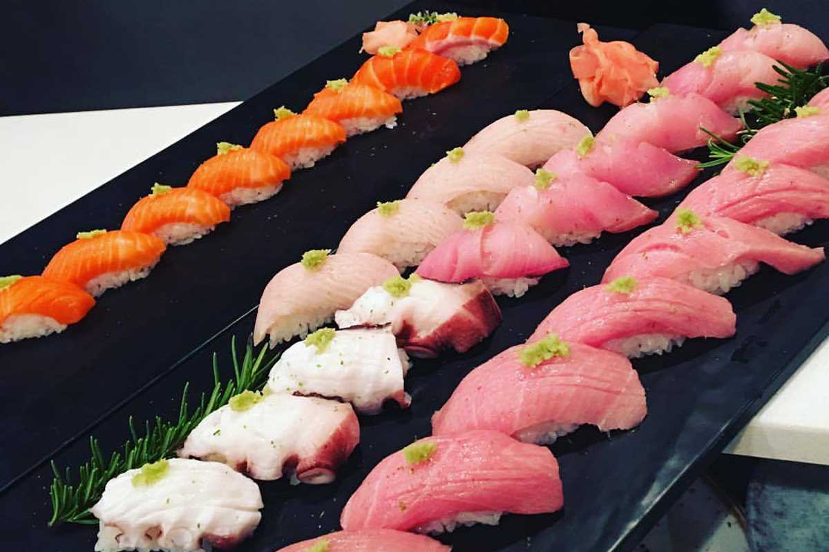 three trays of sashimi