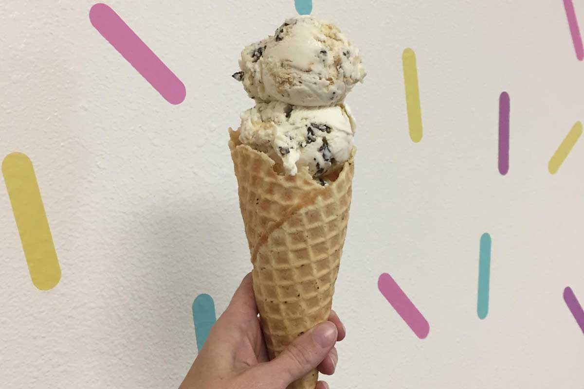 chocolate chip ice cream in a waffle cone