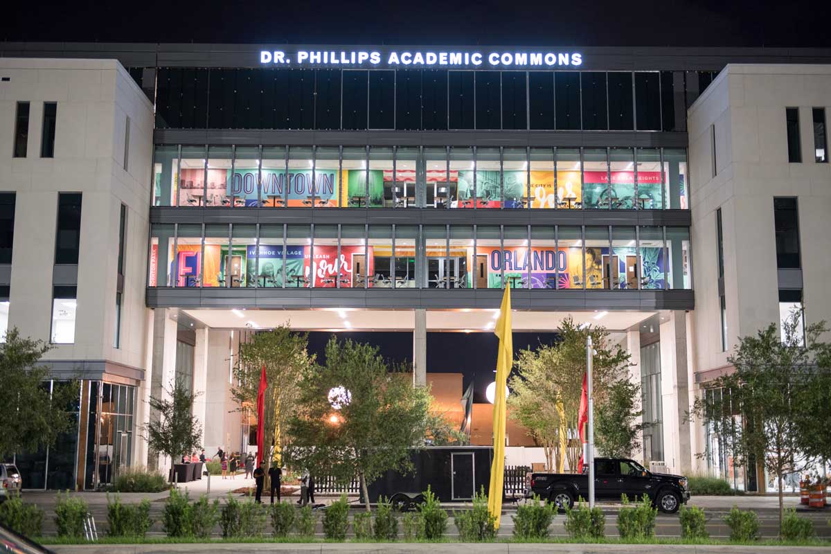 Dr. Phillips Academic Commons building lit up at night