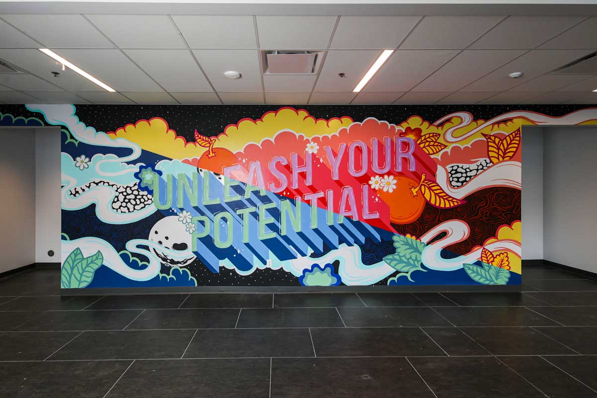 colorful wall mural with words: Unleash Your Potential