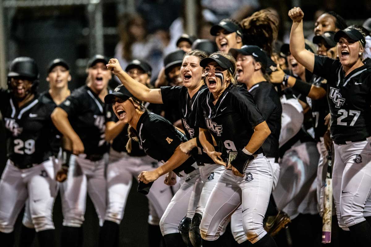 UCF softball team cheers and celebrates
