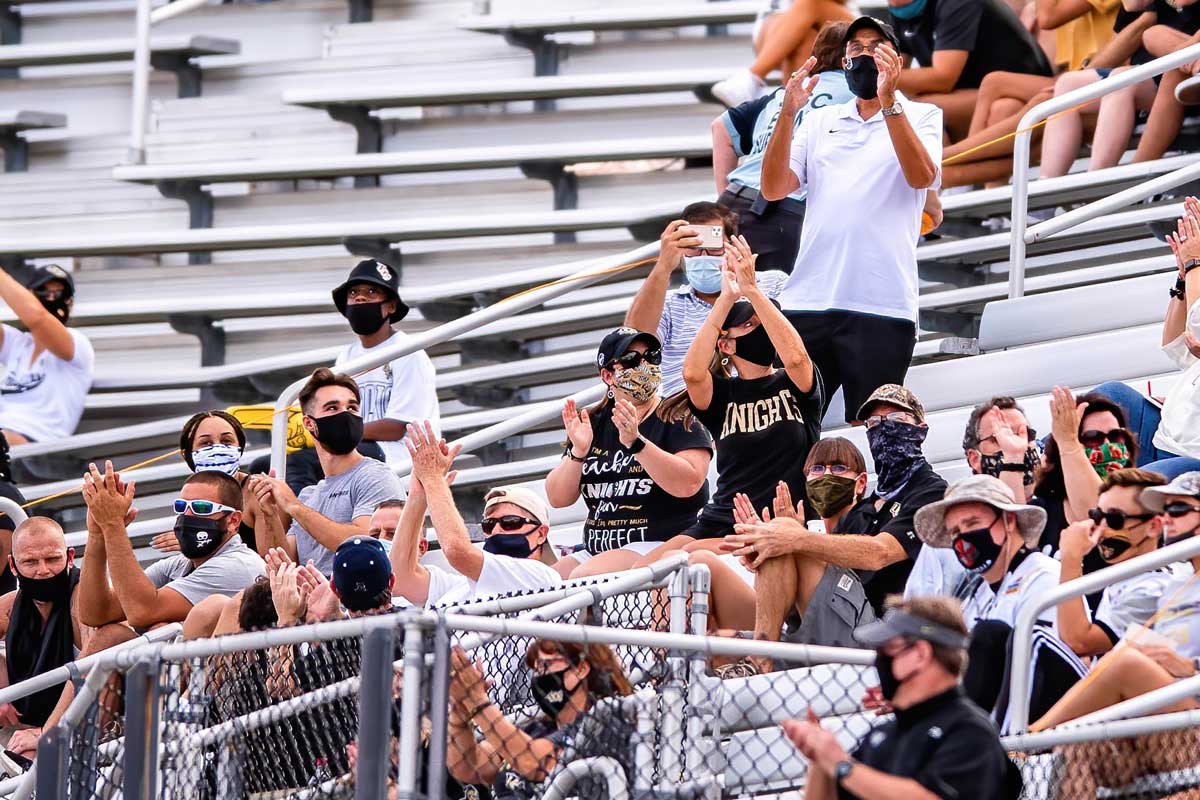 Fans clap in stands