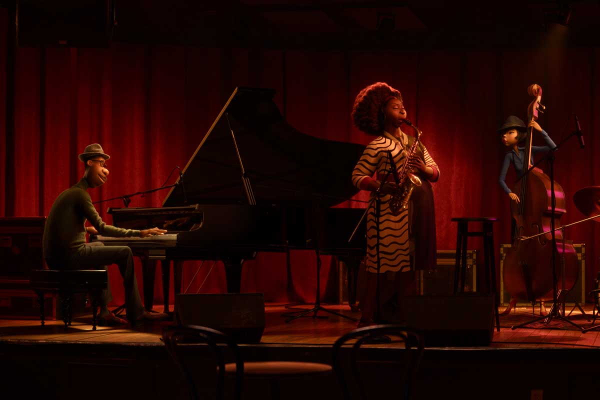 Scene from Disney's Soul: Joe sits at a piano and plays on stage with Jazz band