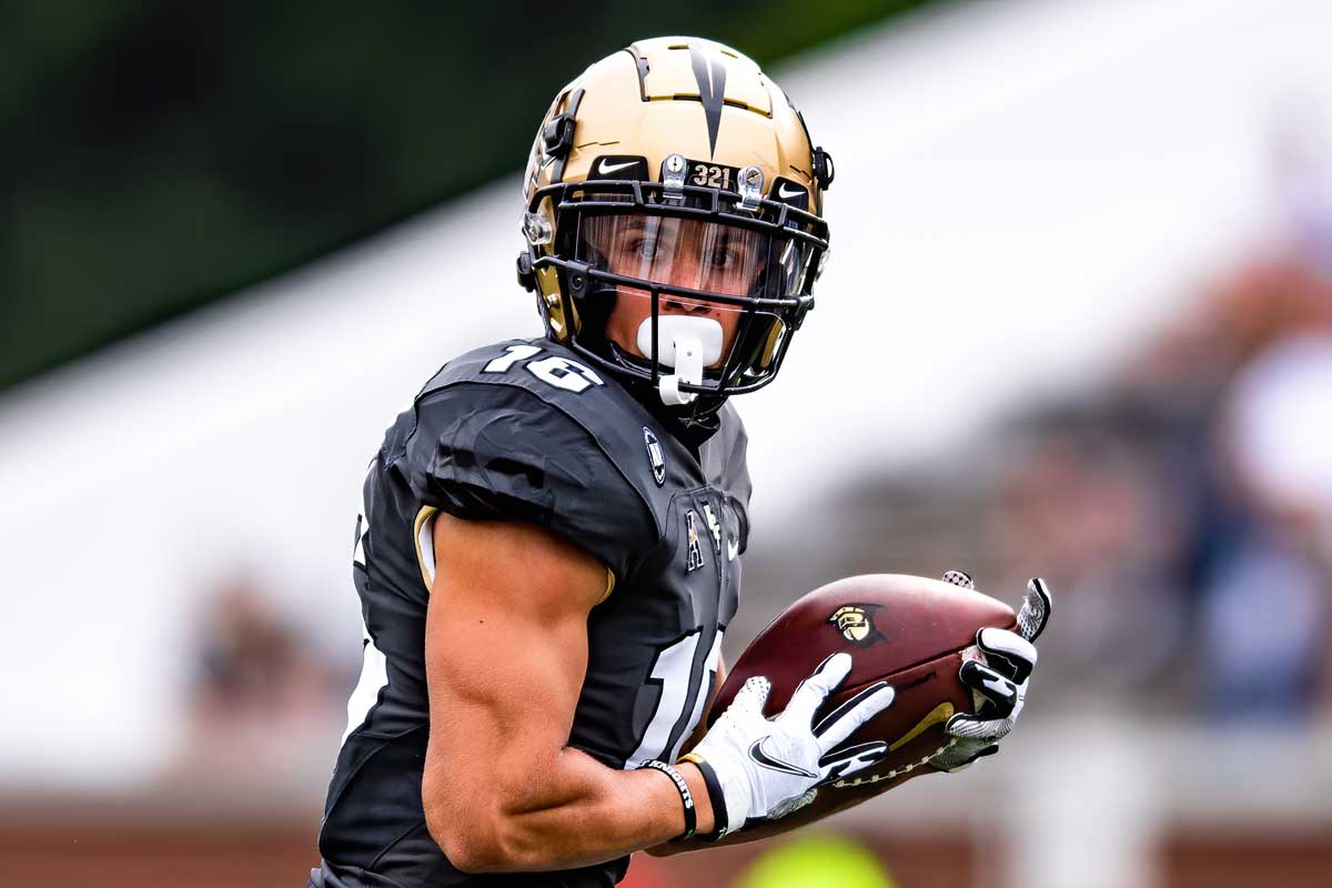 Tre Nixon in gold helmet and black uniform