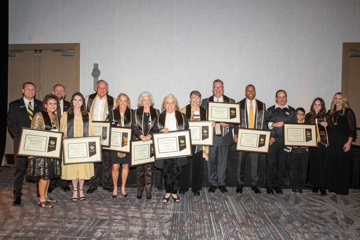 Group of the Shining Knights Award winners holding their plaques of recognition