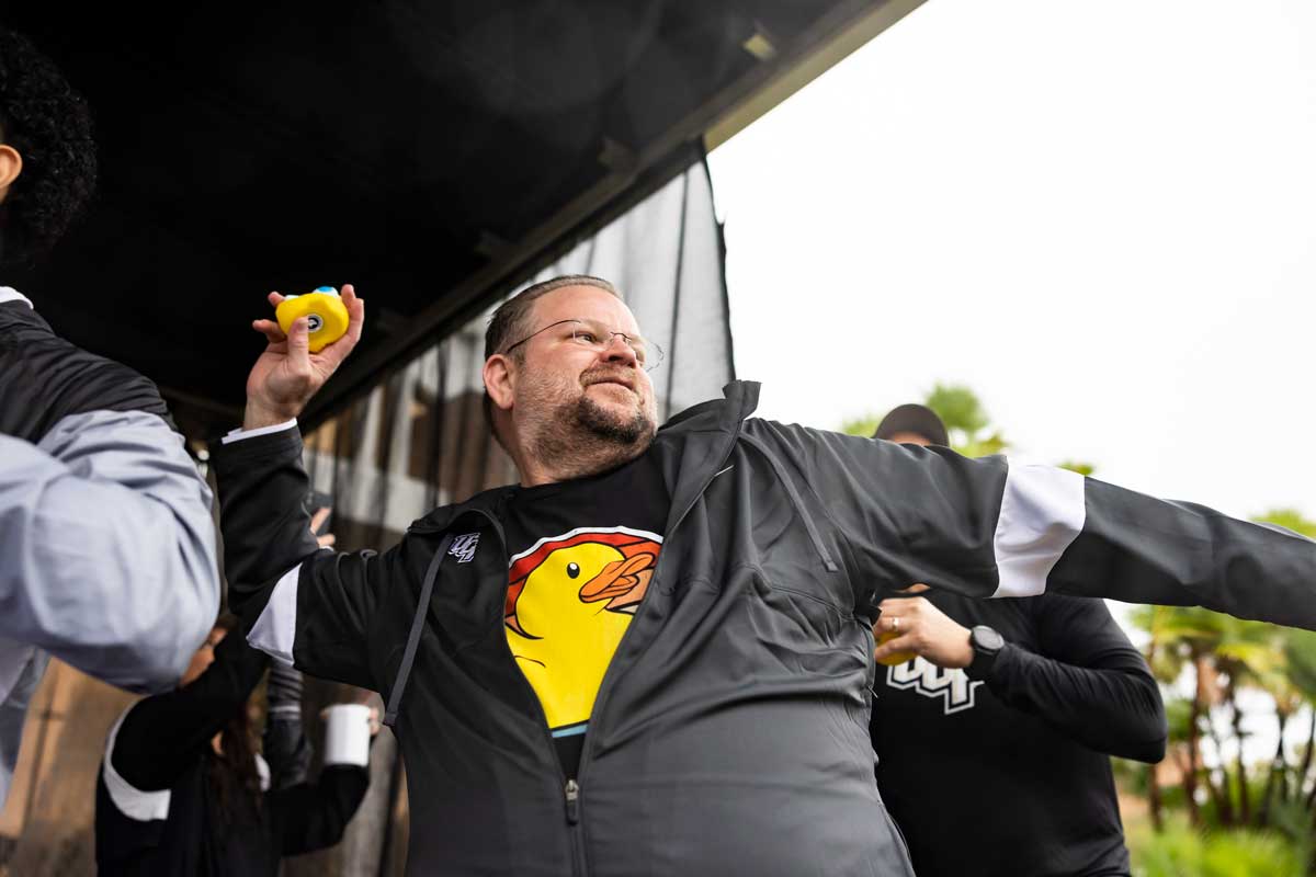 President Alexander N. Cartwright prepares to launch a rubber duck