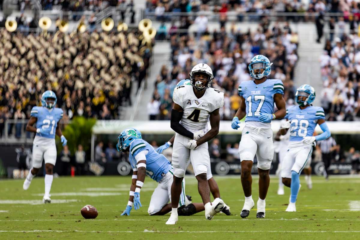 UCF wide receiver Ryan O'Keefe flexes on the field