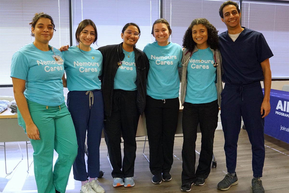 UCF medical students pose for a photo.