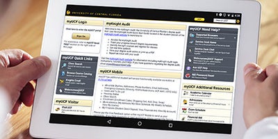 User using a tablet to navigate myucf
