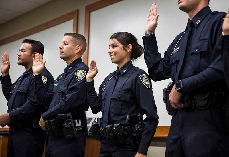 group of police being sworn in