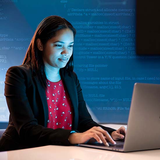 Systems Engineer working at computer