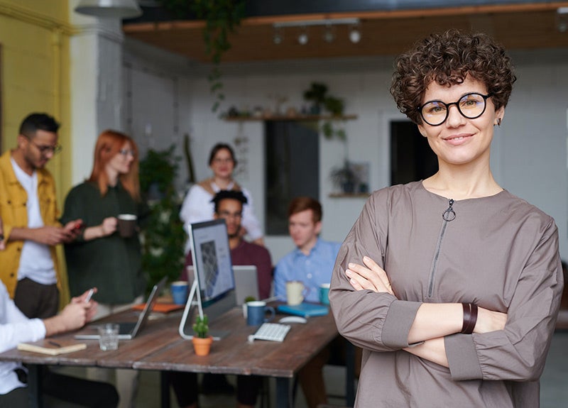 Female with glasses leading through applied learning.