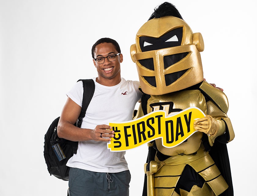 Man and Knightro excited about their first day at UCF.