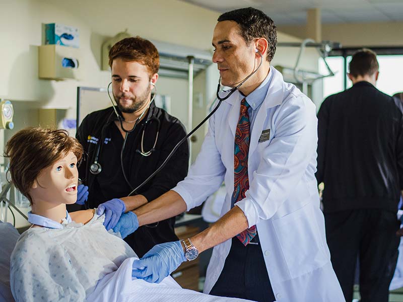 Male nurse teaching