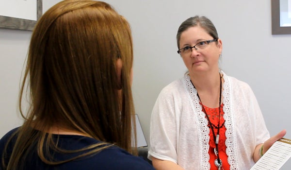 victim services talking with a student